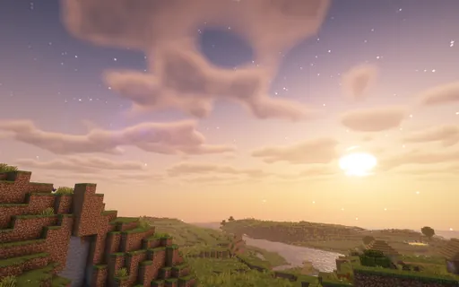 Skull-shaped cloud over a river valley at sunset
