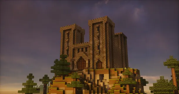 Twin-towered cathedral on a hill at sunset