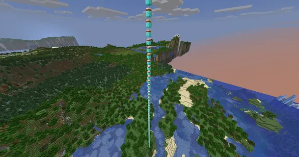 Aerial coastline with cyan pillar, late afternoon