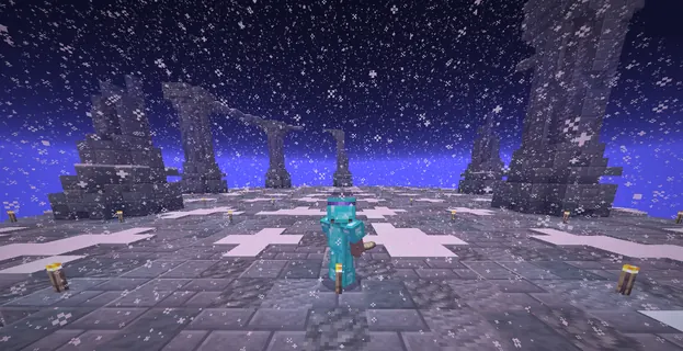 A player in diamond armour in a snowy arena of ruined stone arches at night