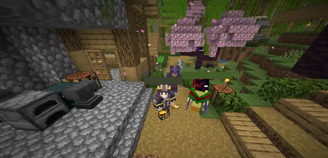 Two players meeting on a dirt path in a cherry-blossom village